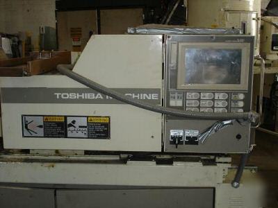60 ton, 2.8 oz. toshiba injection molding machine '96