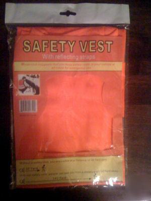New bright orange safety vest with reflecting straps