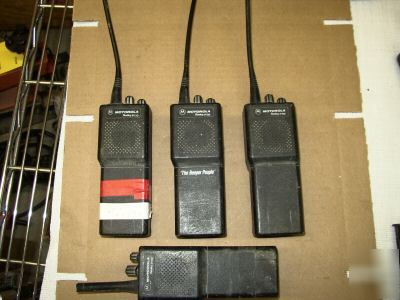 4 motorola radius P110 & 3 chargers for parts 0R repair