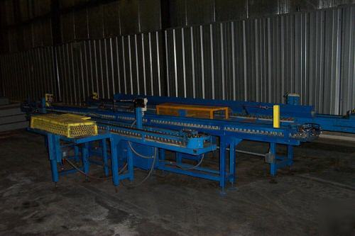 Part positioning indexing conveyors with stops 