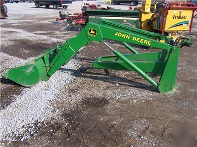 Front end loader for utility farm tractors w/ valve