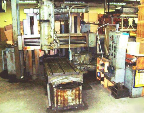 Gray planer type milling machine with side cutting head