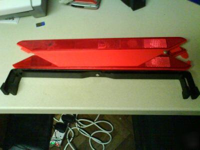 New triangular road traffic reflector ' but damaged'
