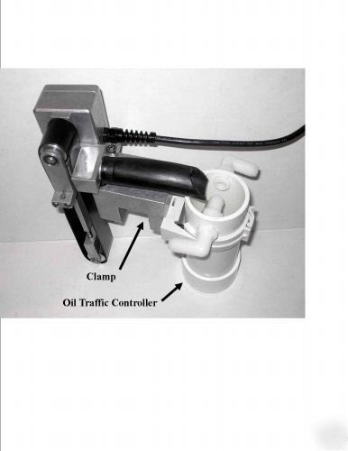 Skimpy skimmer universal clamp & oil traffic controller