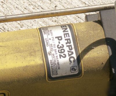 Enerpac p-392 pump with hose and cylinder