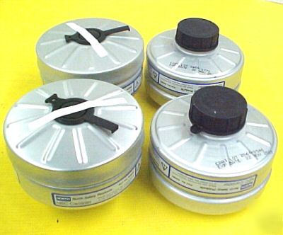 New (4) north 40NBC gas mask respirator canisters